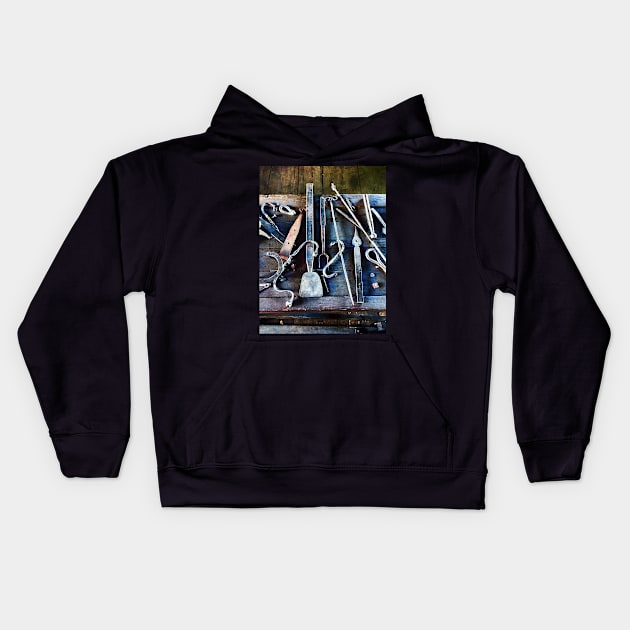 Blacksmith Tools on Table Kids Hoodie by SusanSavad